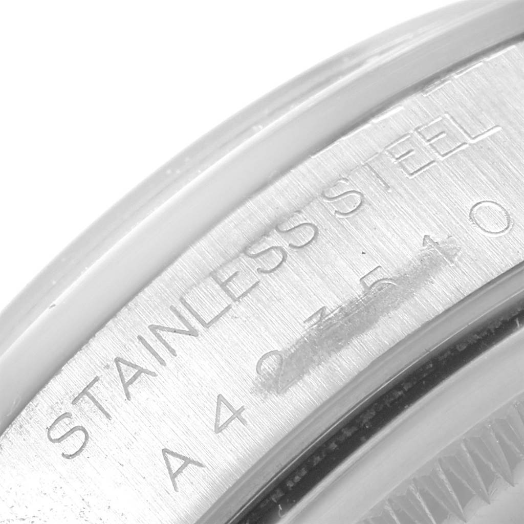 The image shows a close-up of the stainless steel engraving on the bezel of a Rolex Air-King 14000 Men's Stainless Steel Black Dial 14000 Men's Stainless Steel Black Dial watch.