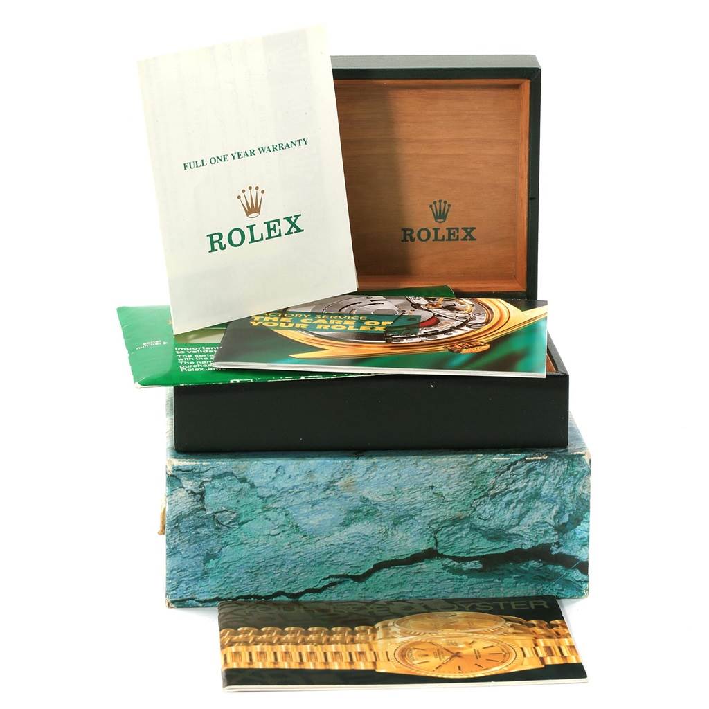 The image shows the packaging and papers for a Rolex Air-King 14000 Men's Stainless Steel Black Dial 14000 Men's Stainless Steel Black Dial watch, including the warranty card, manuals, and the box.