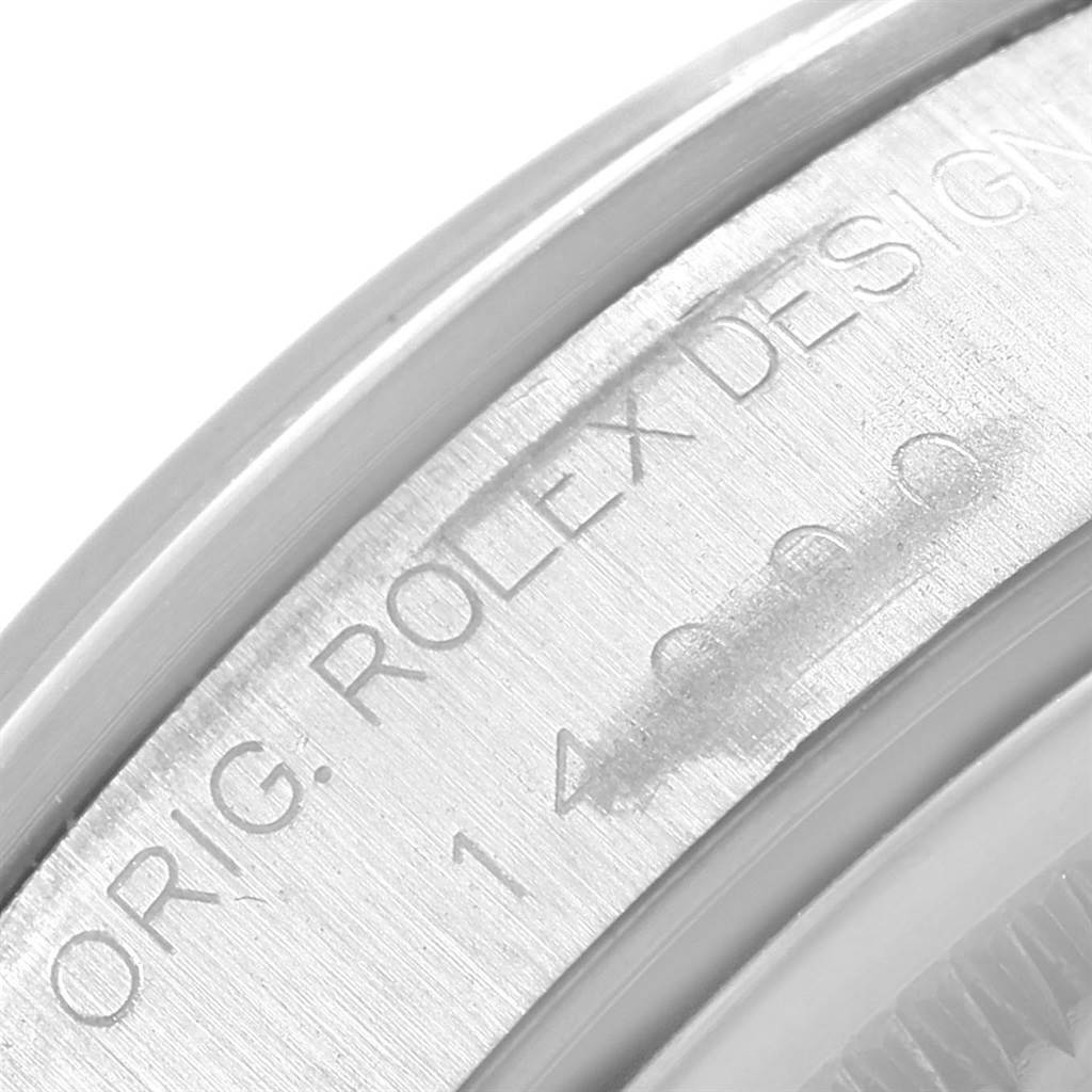 The image shows a close-up of the engraved bezel of a Rolex Air-King 14000 Men's Stainless Steel Black Dial 14000 Men's Stainless Steel Black Dial watch.