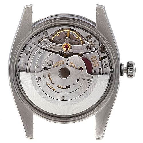 The image shows the back case of the Rolex Air-King 114200 Men's Stainless Steel Silver Dial 114200 Men's Stainless Steel Silver Dial watch, revealing its mechanical movement and internal components.