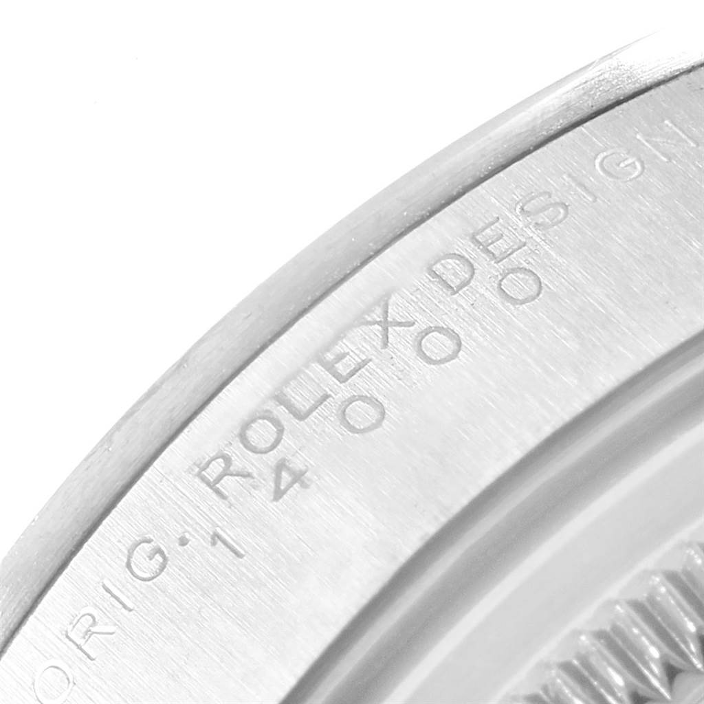 This image shows a close-up of the engraved side of a Rolex Air-King 14000 Men's Stainless Steel Blue Dial 14000 Men's Stainless Steel Blue Dial watch case.