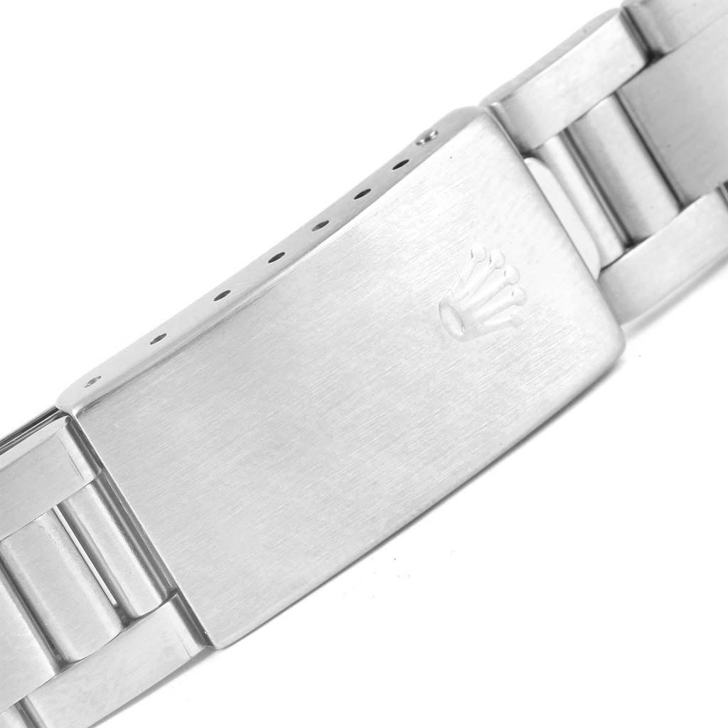 The image shows the clasp and part of the bracelet of a Rolex Air-King 14000 Men's Stainless Steel Pink Dial 14000 Men's Stainless Steel Pink Dial watch, displaying the brand's logo.
