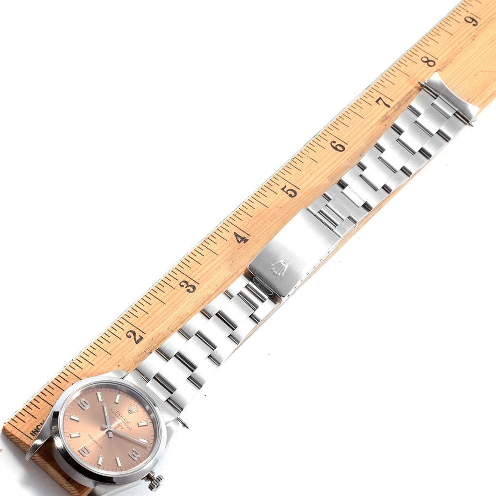 The image shows a Rolex Air-King 14000 Men's Stainless Steel Pink Dial 14000 Men's Stainless Steel Pink Dial watch laid flat next to a ruler, displaying the face, band, and clasp from a top-down angle.
