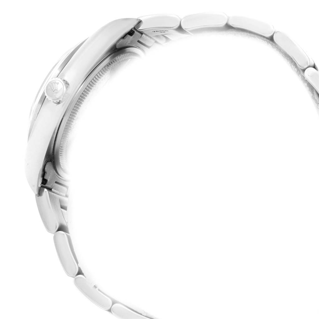 The side view of the Rolex Air-King 14000 Men's Stainless Steel Silver Dial 14000 Men's Stainless Steel Silver Dial watch shows part of the case, crown, and bracelet.