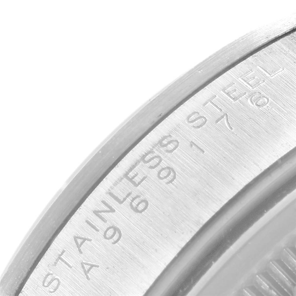 This image shows a close-up of the side engraving on the stainless steel bezel of a Rolex Air-King 14000 Men's Stainless Steel Silver Dial 14000 Men's Stainless Steel Silver Dial watch.