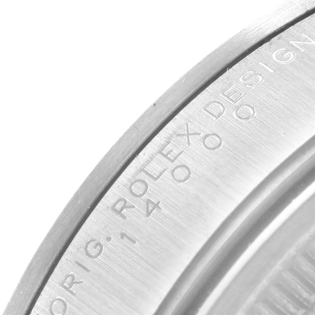 The image shows a close-up of the engraved bezel of a Rolex Air-King 14000 Men's Stainless Steel Silver Dial 14000 Men's Stainless Steel Silver Dial watch.