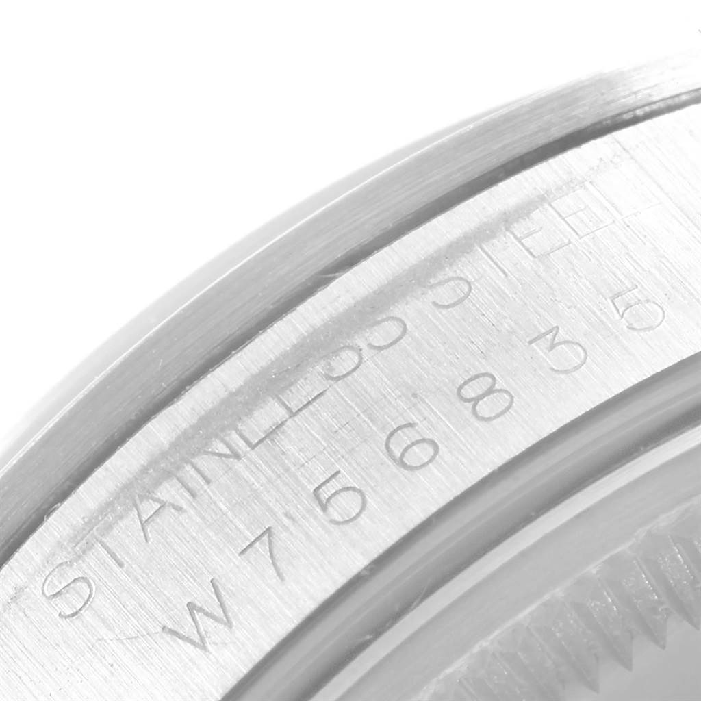 The image shows a close-up of the side of a Rolex Air-King 14000 Men's Stainless Steel Blue Dial 14000 Men's Stainless Steel Blue Dial watch, focusing on the engraved serial number and stainless steel marking.