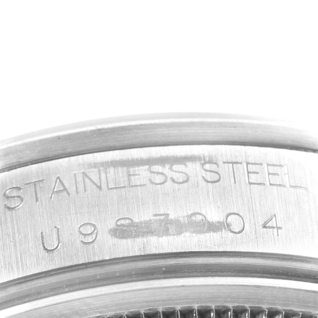 This close-up angle of the Rolex Air-King 14000 Men's Stainless Steel Black Dial 14000 Men's Stainless Steel Black Dial watch shows the stainless steel marking and serial number.