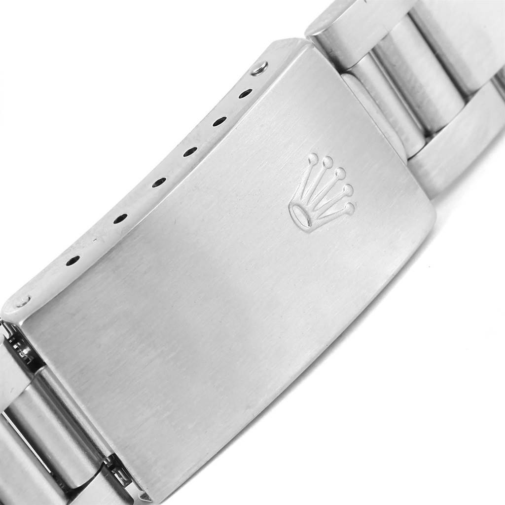 This image shows the stainless steel clasp and part of the bracelet of a Rolex Air-King 14000 Men's Stainless Steel White Dial 14000 Men's Stainless Steel White Dial watch.