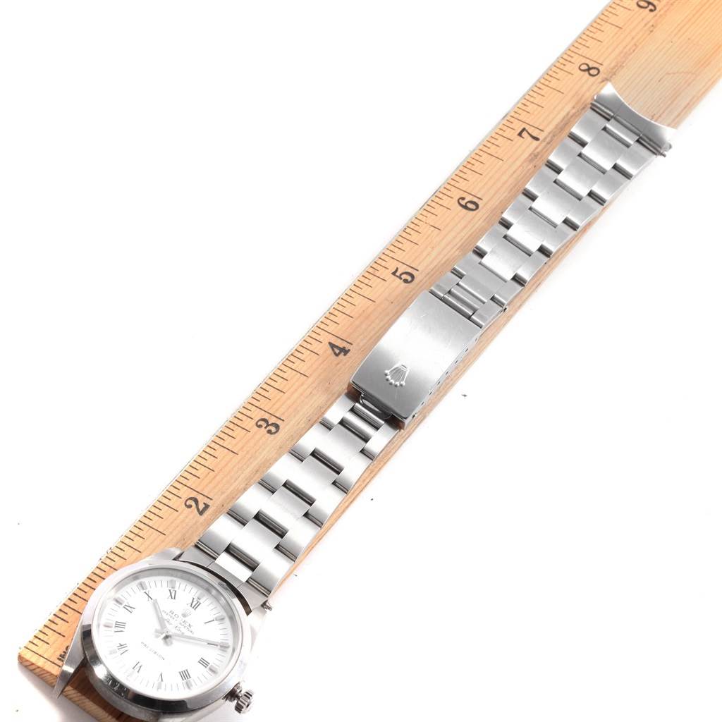 The image shows a Rolex Air-King 14000 Men's Stainless Steel White Dial 14000 Men's Stainless Steel White Dial watch laid flat next to a ruler, displaying the watch face, bracelet, and clasp.