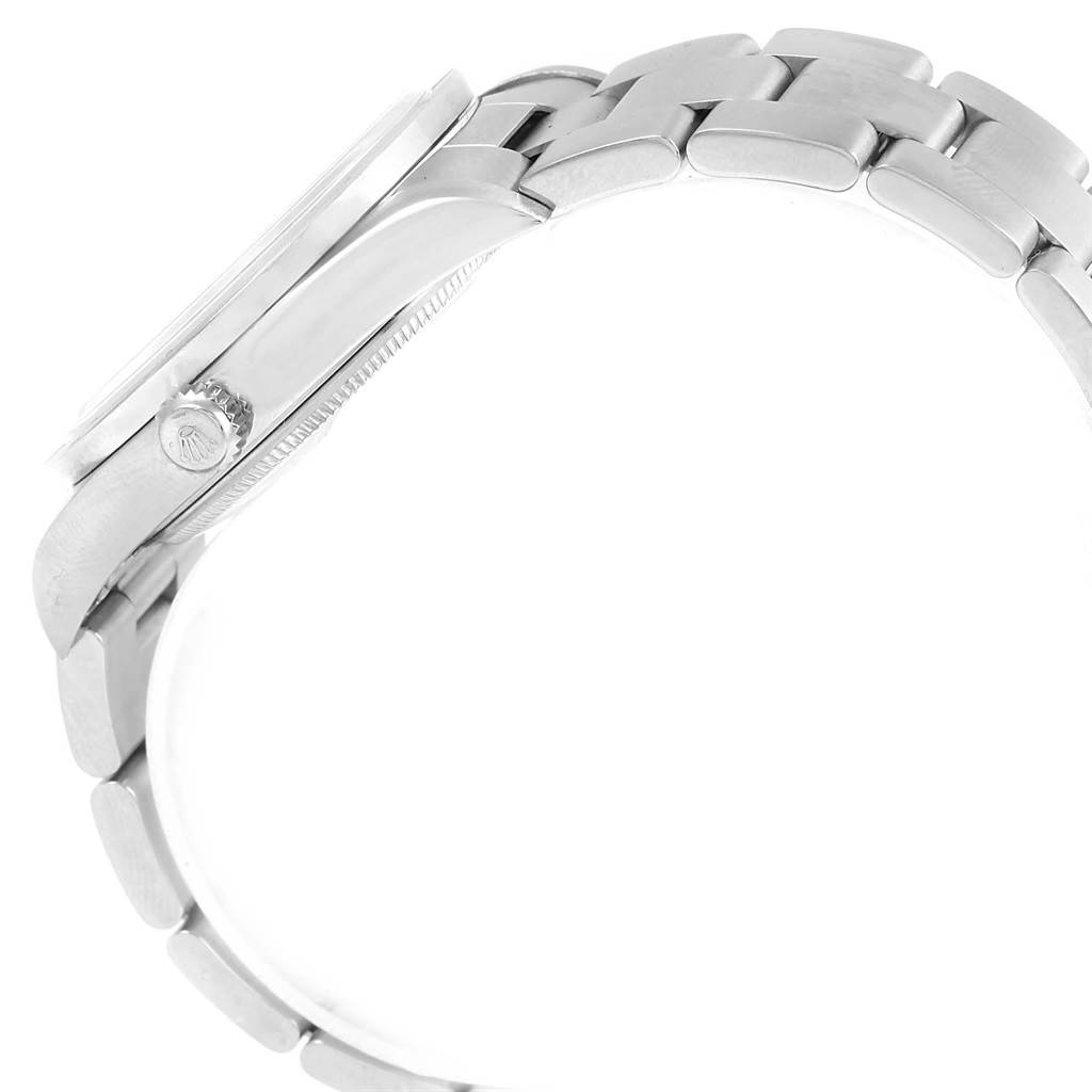 The image shows a side view of the Rolex Air-King 14010 Men's Stainless Steel Silver Dial 14010 Men's Stainless Steel Silver Dial model, focusing on the crown and part of the metal bracelet.