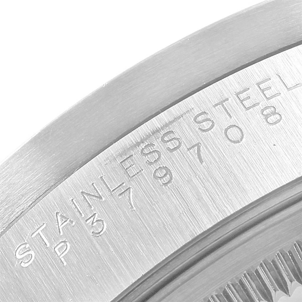 The image shows a close-up of the engraving on the case back of a Rolex Air-King 14010 Men's Stainless Steel Silver Dial 14010 Men's Stainless Steel Silver Dial watch.