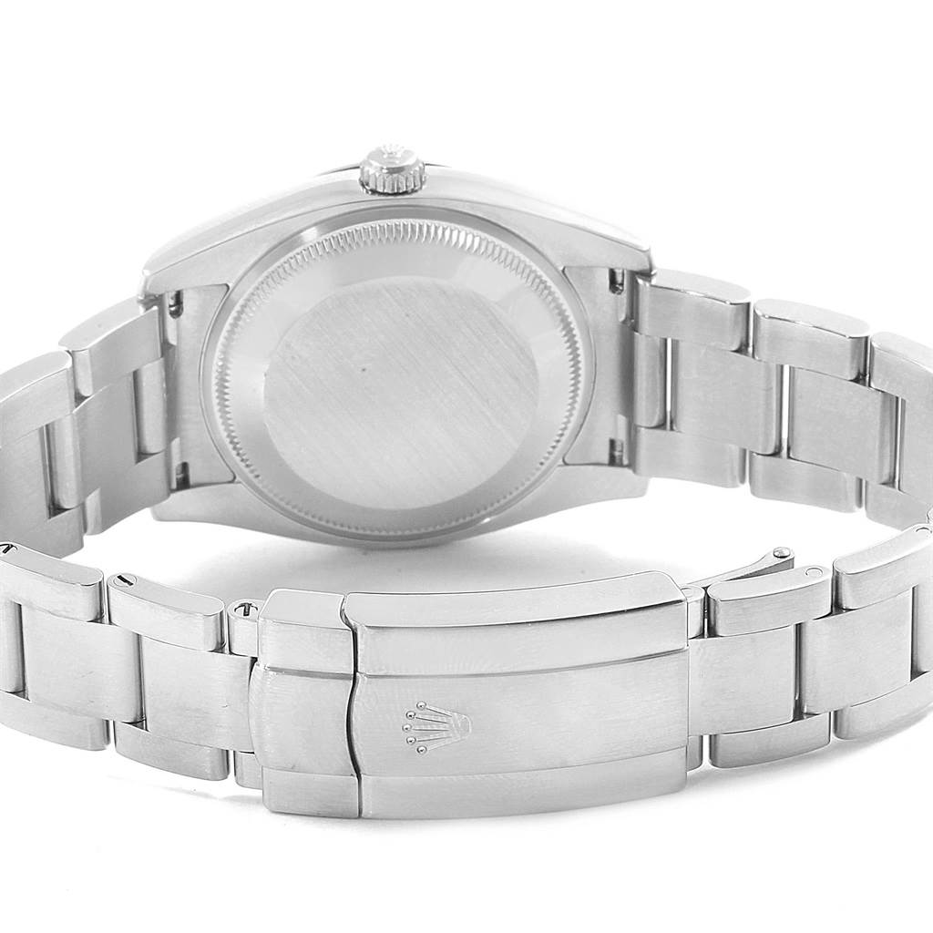 This image shows the back case, crown, and clasp of the Rolex Air-King 114200 Stainless Steel Silver Dial 114200 Stainless Steel Silver Dial watch, viewed from the rear.