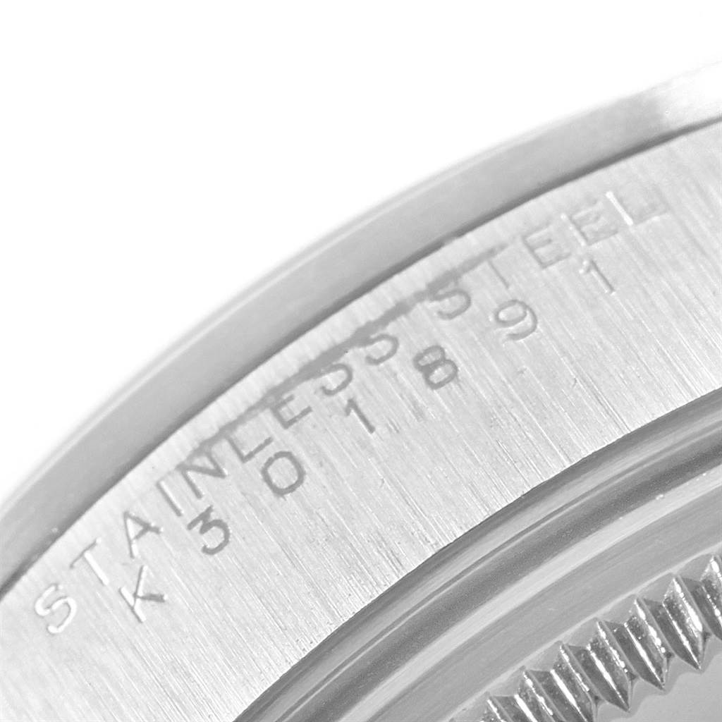 The image shows a close-up of the stainless steel case back with engravings on a Rolex Air-King 14000 Men's Stainless Steel Blue Dial 14000 Men's Stainless Steel Blue Dial watch.