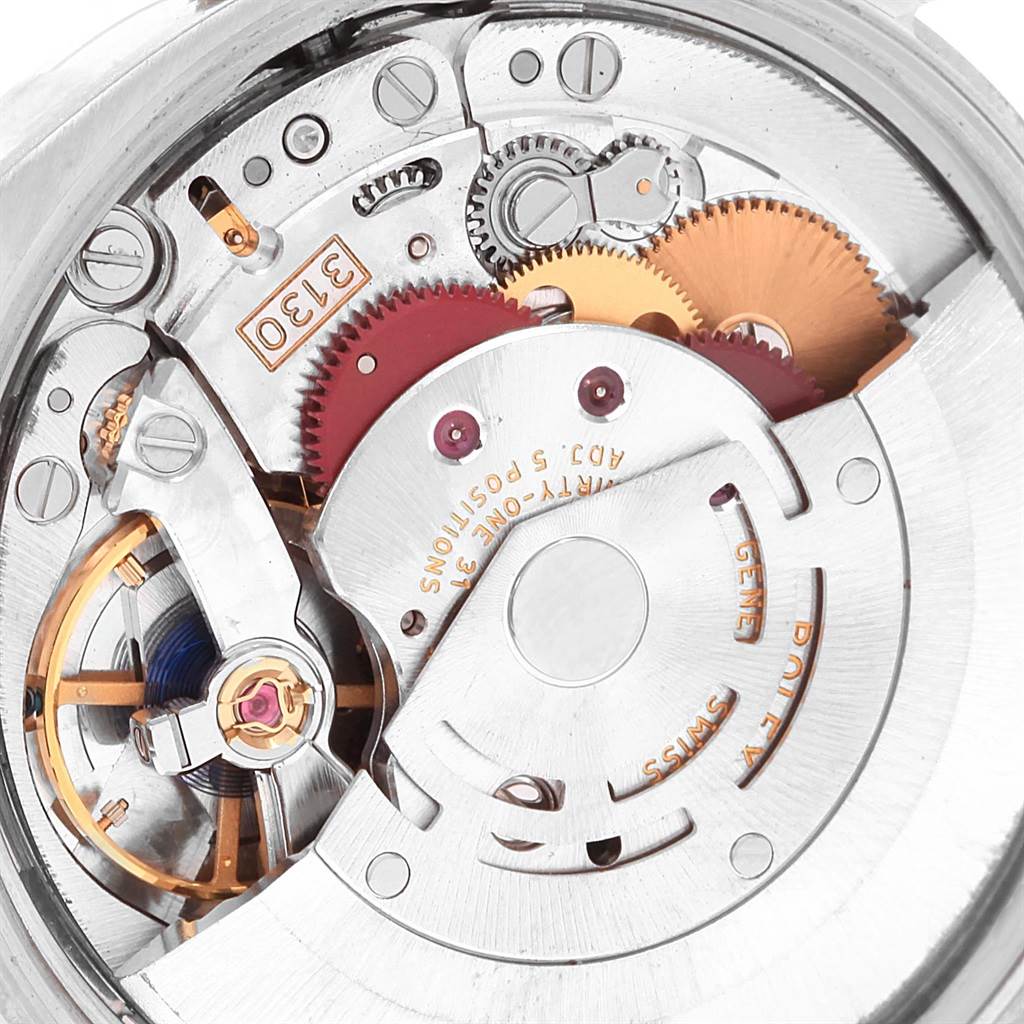 This image shows an inner, detailed look at the movement mechanism of a Rolex Air-King 114200 Men's Stainless Steel Blue Dial 114200 Men's Stainless Steel Blue Dial watch, highlighting its gears and components.