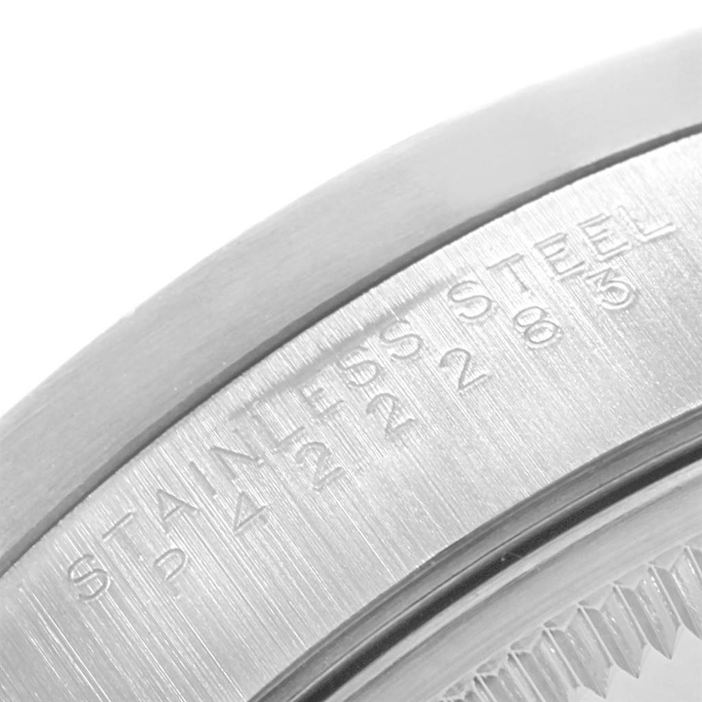 The image shows a close-up of the engraved text on the stainless steel case back of a Rolex Air-King 14010 Men's Stainless Steel Black Dial 14010 Men's Stainless Steel Black Dial watch.