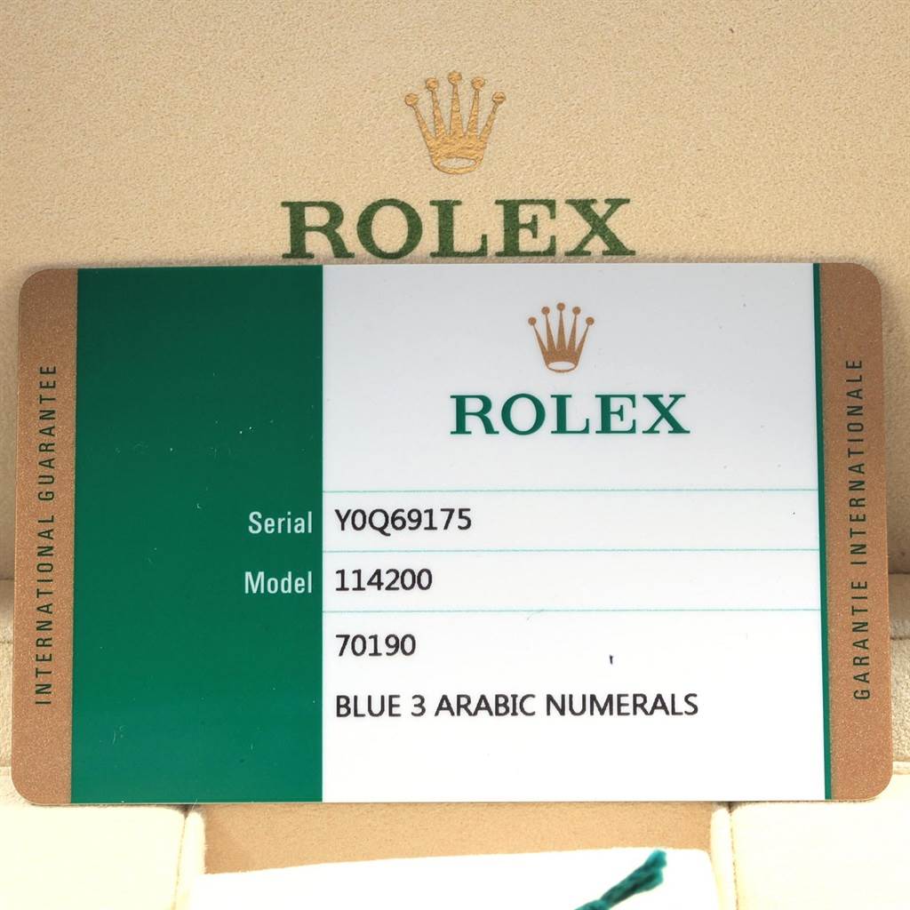 This image shows a Rolex international guarantee card for the Air-King model 114200.
