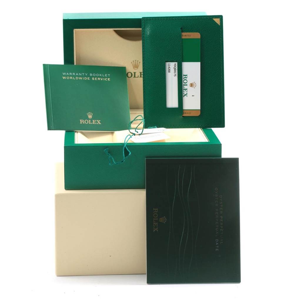 The image shows the box, warranty booklet, authentication card, and other accessories for a Rolex Air-King 114200 Men's Stainless Steel Blue Dial 114200 Men's Stainless Steel Blue Dial watch.