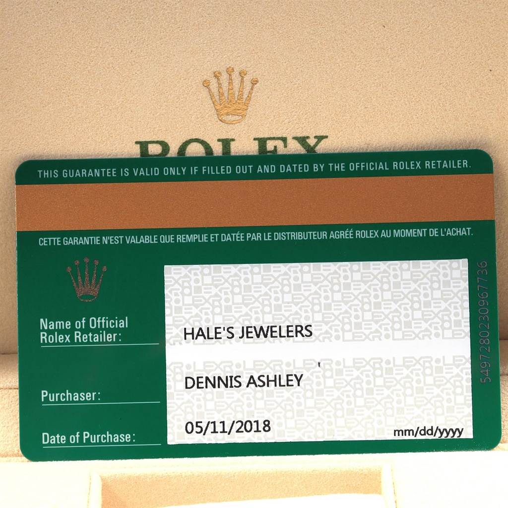 The image shows a green Rolex warranty card with purchase details and the Rolex logo on the packaging.