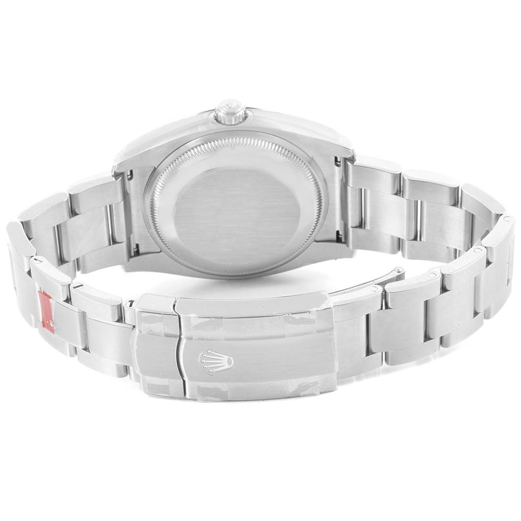 The image shows the backside and clasp of a Rolex Air-King 114200 Men's Stainless Steel Blue Dial 114200 Men's Stainless Steel Blue Dial watch, highlighting its stainless steel bracelet and case back.