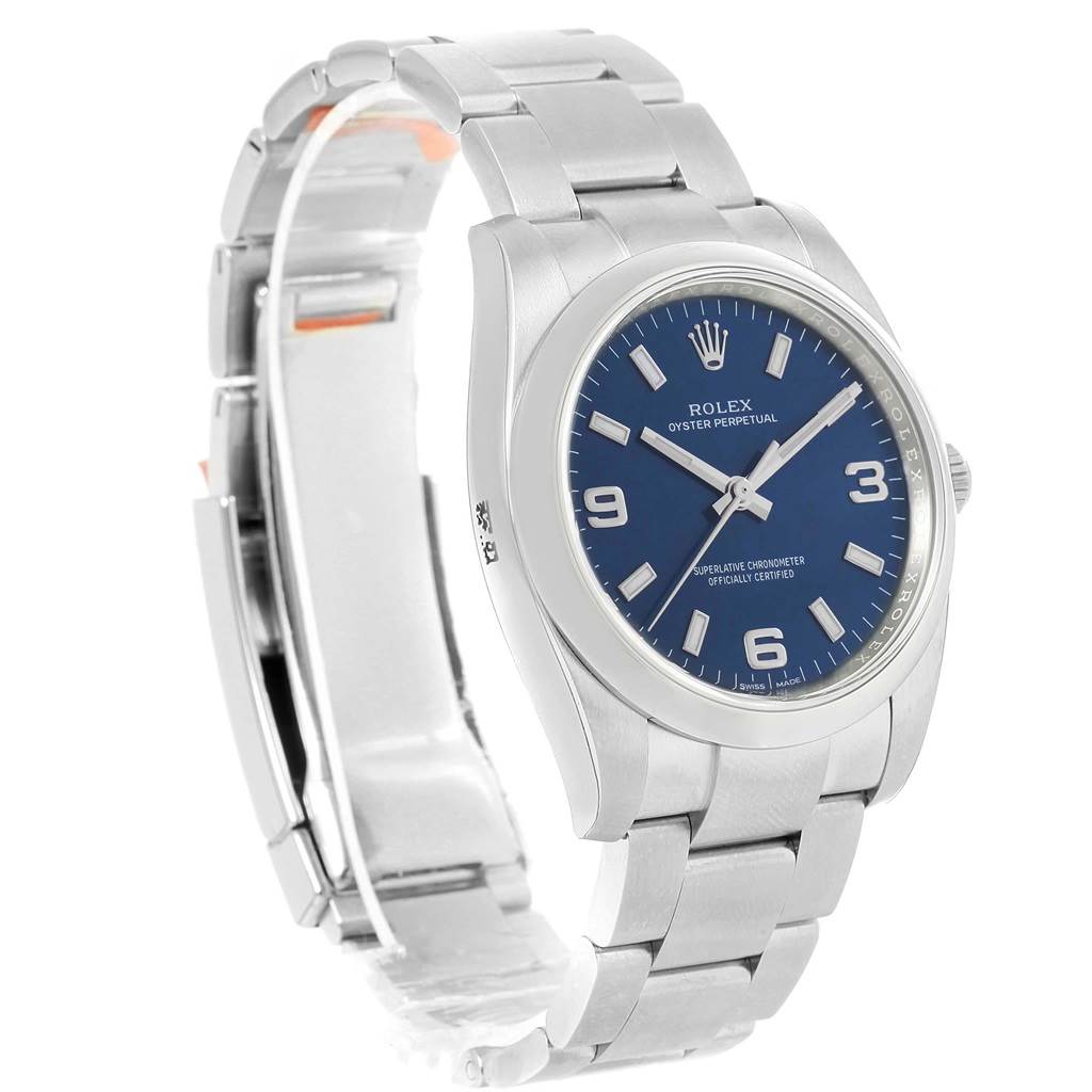 The image shows a Rolex Air-King 114200 Men's Stainless Steel Blue Dial 114200 Men's Stainless Steel Blue Dial watch at an angle highlighting the face, bezel, and bracelet.