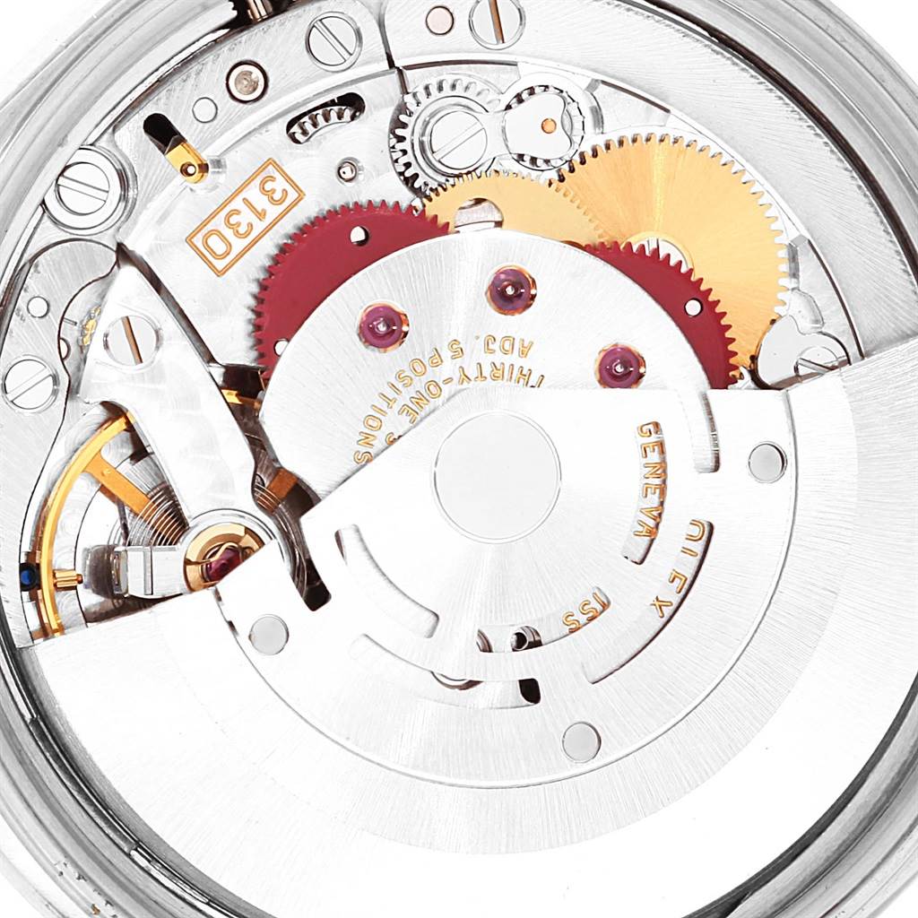 This image shows a close-up of the mechanical movement inside a Rolex Air-King 14000 Men's Stainless Steel Black Dial 14000 Men's Stainless Steel Black Dial watch, highlighting gears and components.