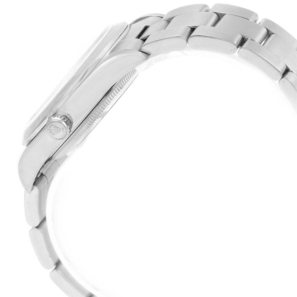 The Rolex Air-King 14000 Men's Stainless Steel Blue Dial 14000 Men's Stainless Steel Blue Dial watch is shown from a side angle, highlighting the crown, case, and part of the bracelet.