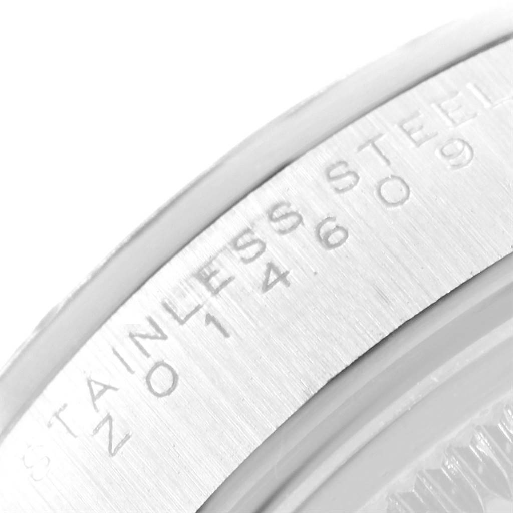 The image shows a close-up angle of the stainless steel back casing of a Rolex Air-King 14000 Men's Stainless Steel Black Dial 14000 Men's Stainless Steel Black Dial watch.