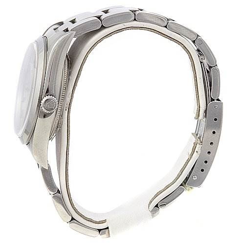 The Rolex Air-King 1400 Men's Stainless Steel Silver Dial 1400 Men's Stainless Steel Silver Dial watch is shown from a side angle, displaying the side profile, crown, and bracelet.