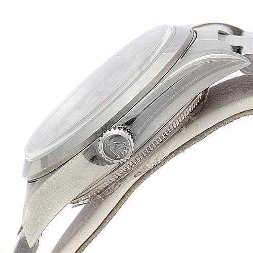 This image shows a side profile view of a Rolex Air-King 1400 Men's Stainless Steel Silver Dial 1400 Men's Stainless Steel Silver Dial watch, highlighting its crown, case, and part of the bracelet.