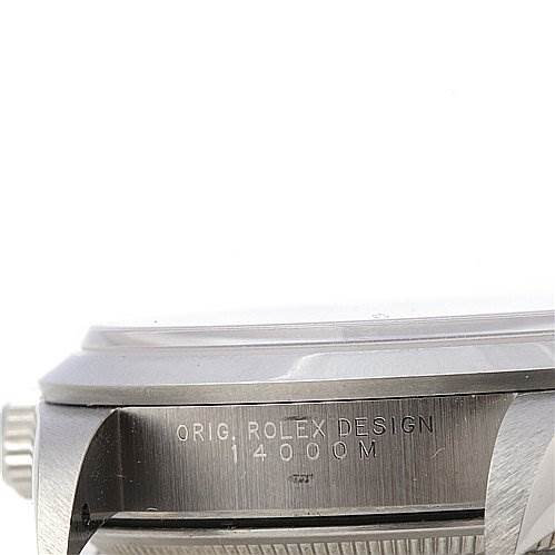 The image shows a side angle of a Rolex Air-King 1400 Men's Stainless Steel Silver Dial 1400 Men's Stainless Steel Silver Dial watch, highlighting the crown and the engraved "ORIG. ROLEX DESIGN 14000M."