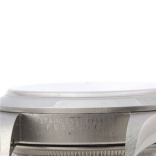 The image shows a close-up side view of a stainless steel Rolex Air-King 1400 Men's Stainless Steel Silver Dial 1400 Men's Stainless Steel Silver Dial watch case with its serial number engraved.