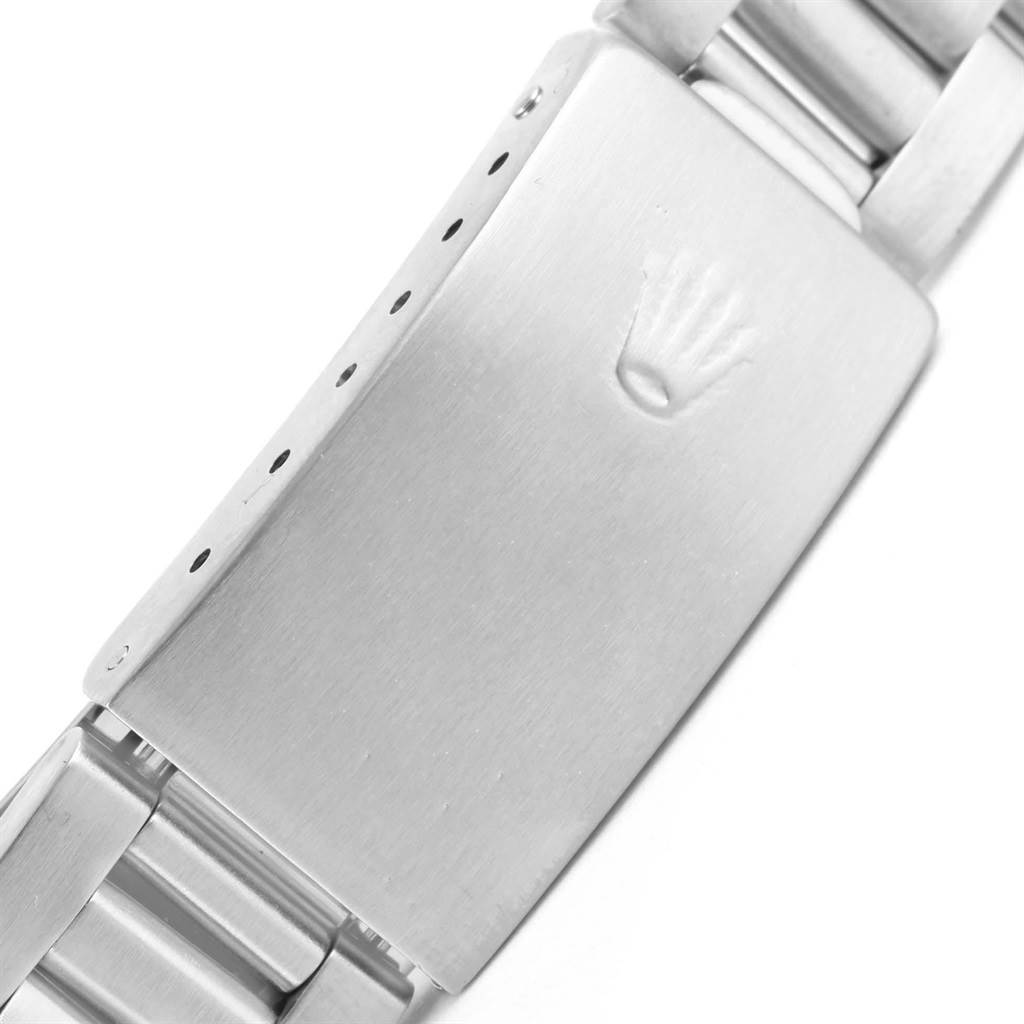 The image shows the clasp of a Rolex Air-King Men's Stainless Steel Silver Dial Men's Stainless Steel Silver Dial watch bracelet close-up, featuring the Rolex logo.