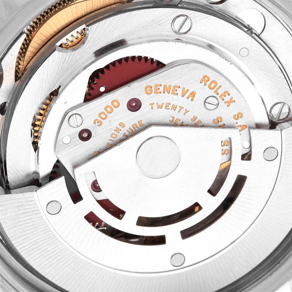 This image shows a close-up view of the Rolex Air-King Men's Stainless Steel Silver Dial Men's Stainless Steel Silver Dial watch's inner mechanical movement components.