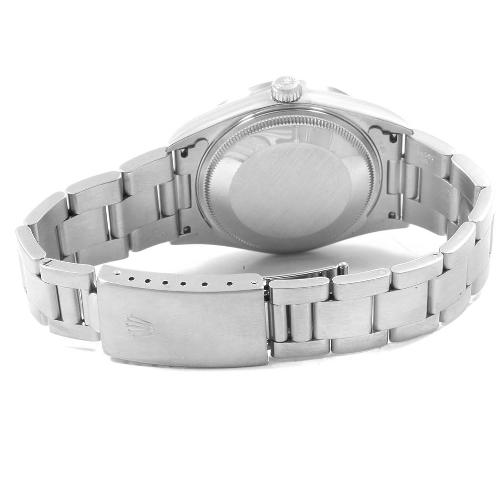 This image shows the back view of a Rolex Air-King 14010 Men's Stainless Steel Blue Dial 14010 Men's Stainless Steel Blue Dial watch, featuring the case back and the metal bracelet with the clasp.