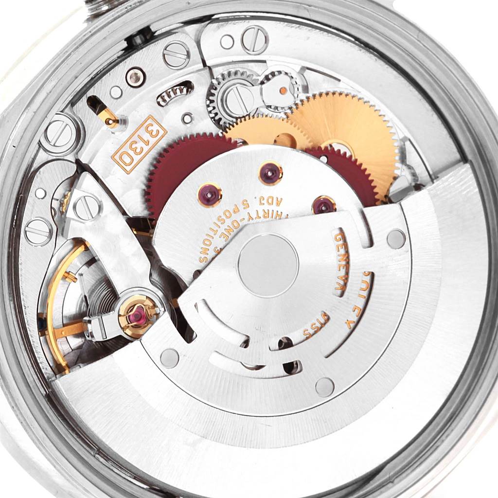 Here's a close-up view of the Rolex Air-King 14010 Men's Stainless Steel Blue Dial 14010 Men's Stainless Steel Blue Dial watch movement, showing gears and internal components.