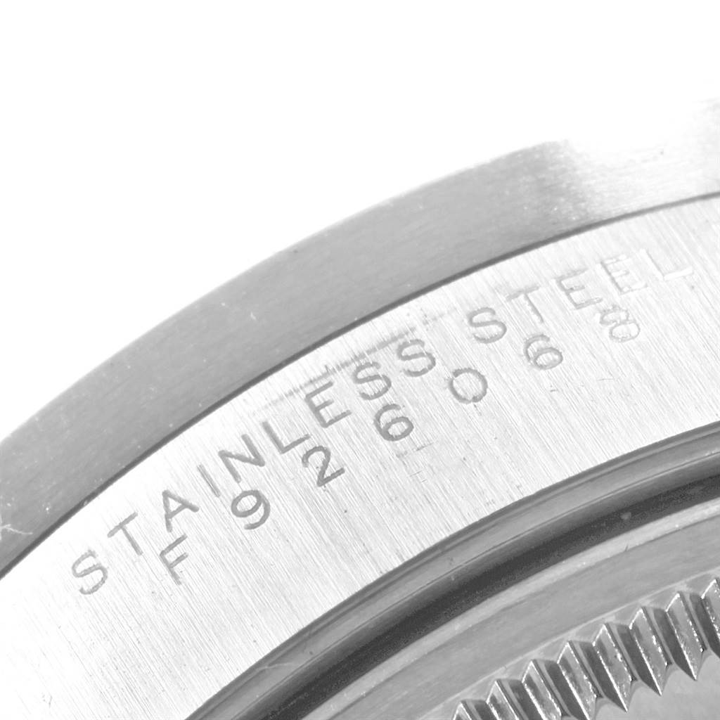 This image shows a close-up of the stainless steel back case of the Rolex Air-King 14010 Men's Stainless Steel Blue Dial 14010 Men's Stainless Steel Blue Dial watch, highlighting the model number and text engraving.