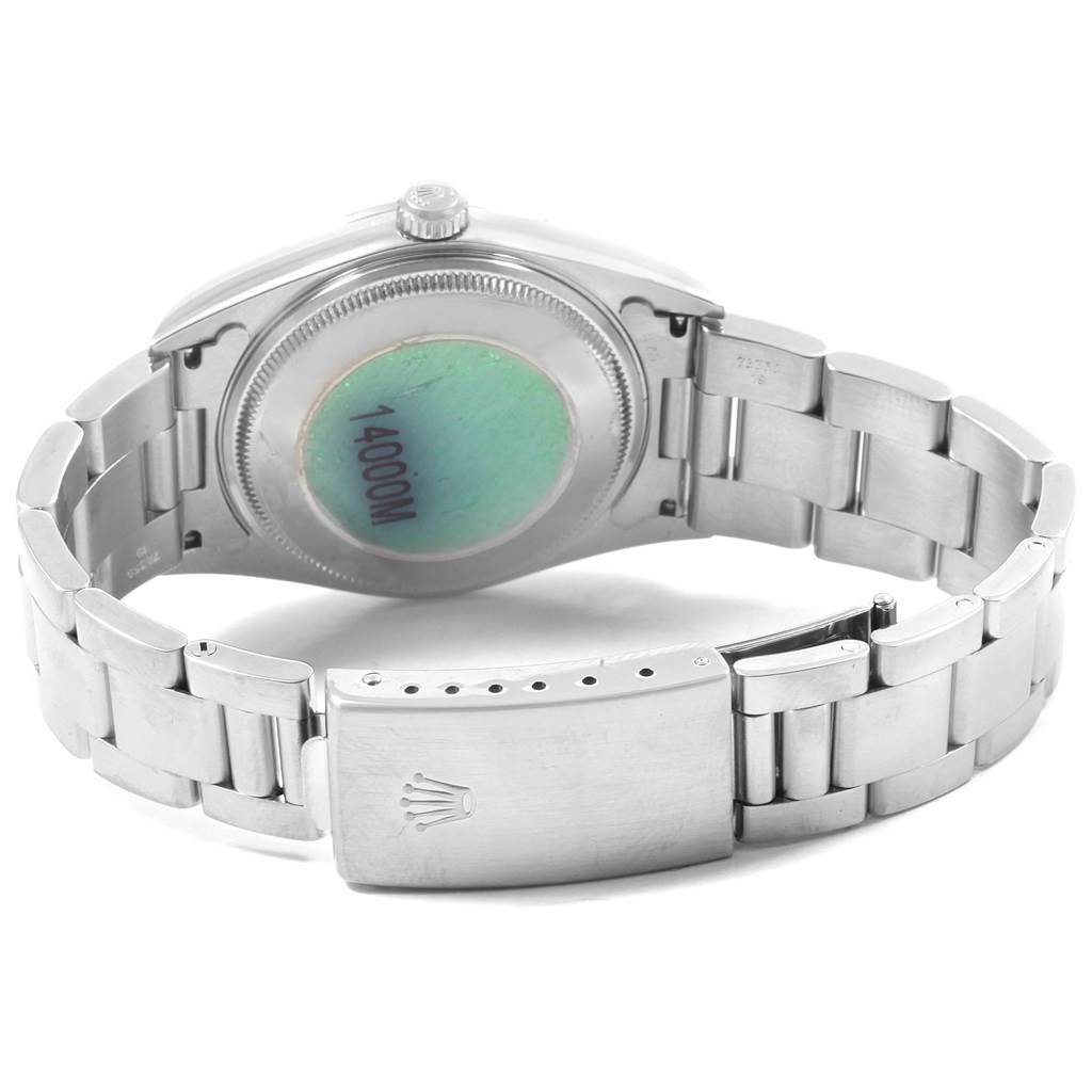 The image shows the back case, crown, and bracelet of a Rolex Air-King 14000 Men's Stainless Steel White Dial 14000 Men's Stainless Steel White Dial watch opened flat.