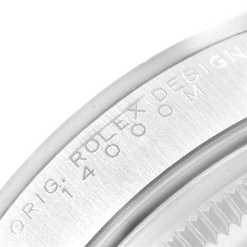 The image shows a close-up view of the case back edge of a Rolex Air-King 14000 Men's Stainless Steel Silver Dial 14000 Men's Stainless Steel Silver Dial watch, highlighting the engraving detail.