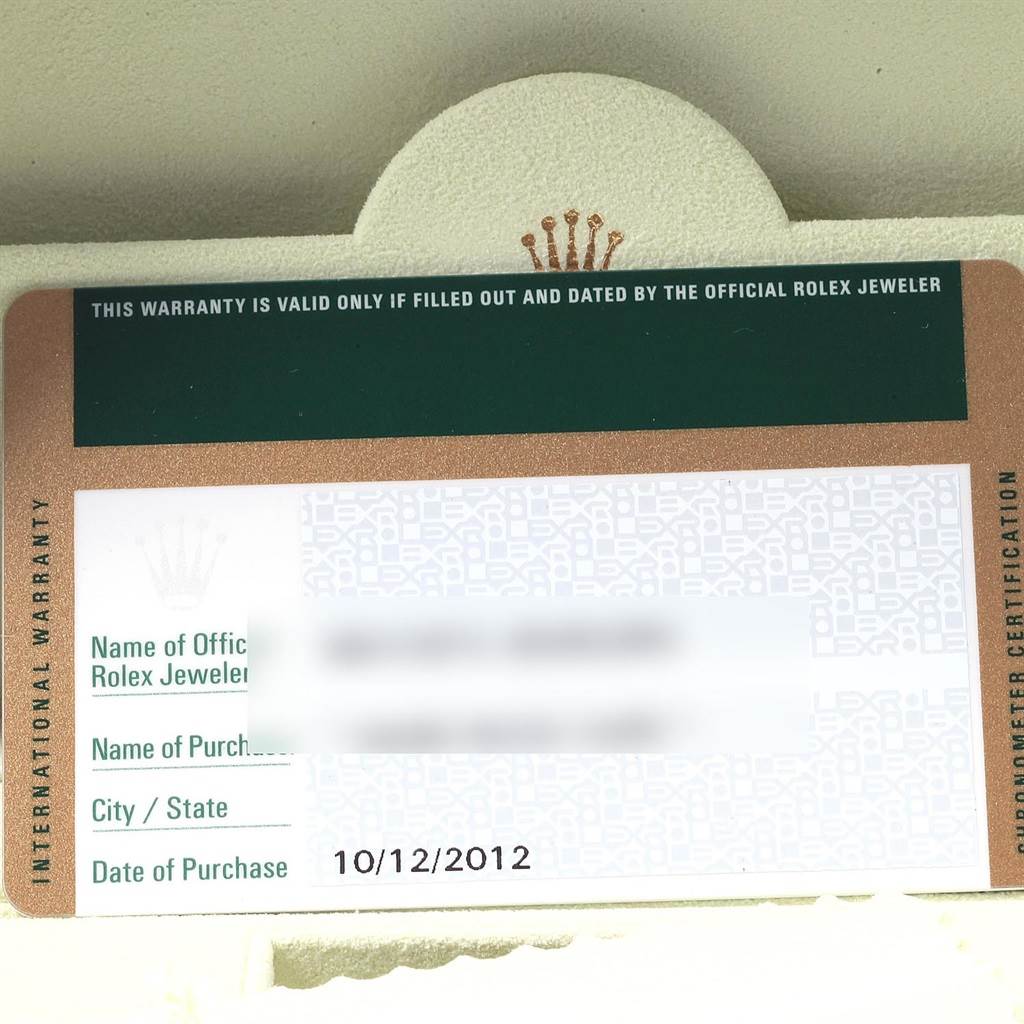 The image shows a close-up of the International Warranty card for a Rolex Air-King 114200 Men's Stainless Steel White Dial 114200 Men's Stainless Steel White Dial watch, highlighting the date of purchase.