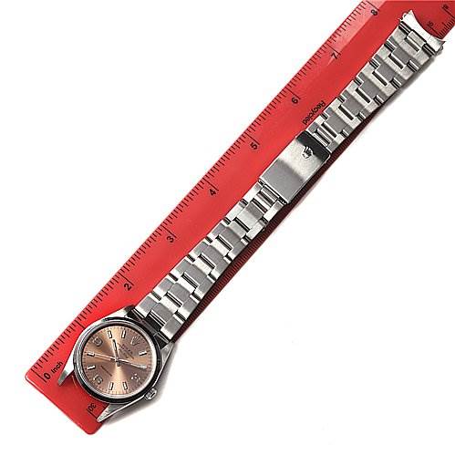 The Rolex Air-King 14000M Men's Stainless Steel Brown Dial 14000M Men's Stainless Steel Brown Dial watch is shown laid flat next to a red ruler, displaying the entire band and watch face.