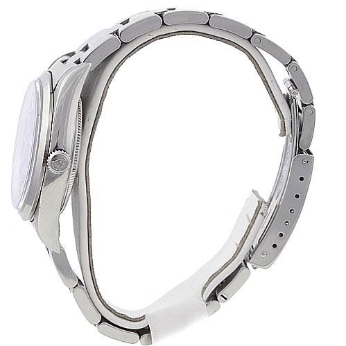 The Rolex Air-King 14000M Men's Stainless Steel Blue Dial 14000M Men's Stainless Steel Blue Dial watch is shown from a side angle, showcasing the case, crown, and partially open bracelet.