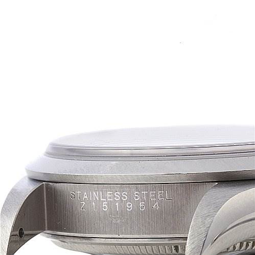 This is a side view of the stainless steel case back of the Rolex Air-King 14000M Men's Stainless Steel Blue Dial 14000M Men's Stainless Steel Blue Dial watch.