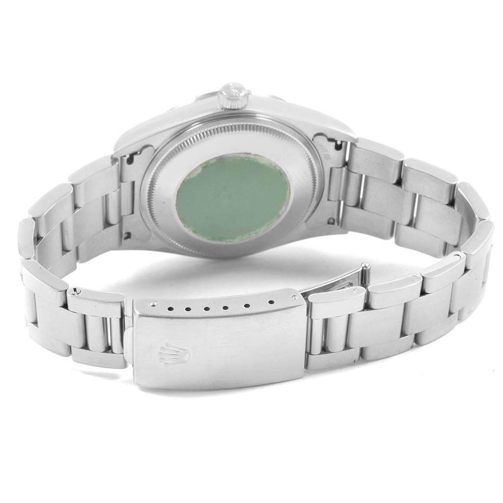 The image shows the back of a Rolex Air-King 14000 Men's Stainless Steel Blue Dial 14000 Men's Stainless Steel Blue Dial watch, including the case back, bracelet, and clasp.