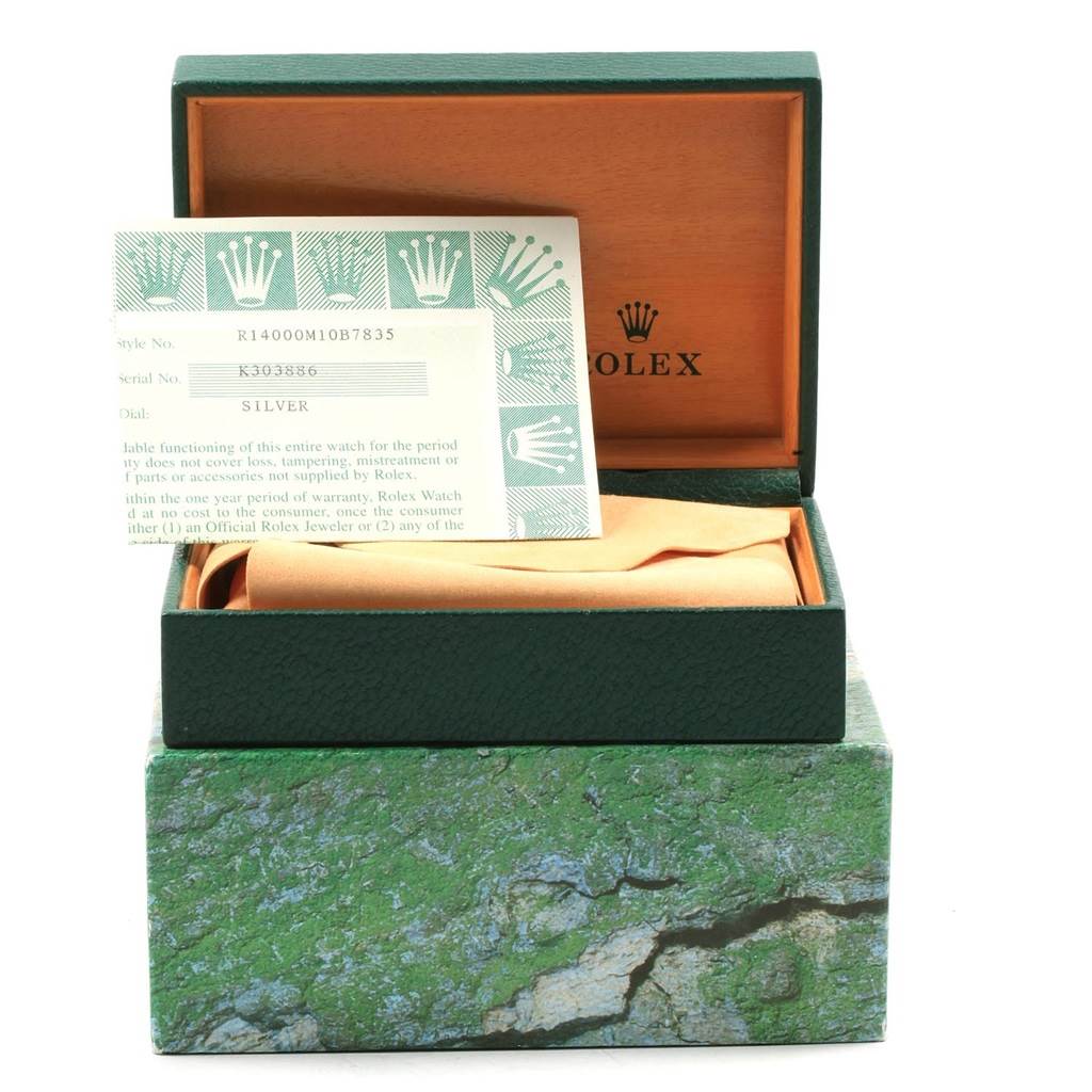 The image shows an open Rolex Air-King 14000 Men's Stainless Steel Silver Dial 14000 Men's Stainless Steel Silver Dial watch box with a warranty card on top.