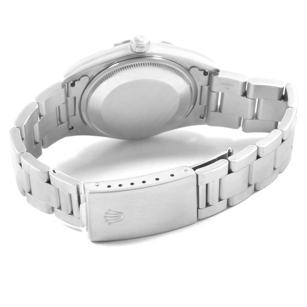 The image shows the back case and bracelet of an Air-King model by Rolex from a rear angle.