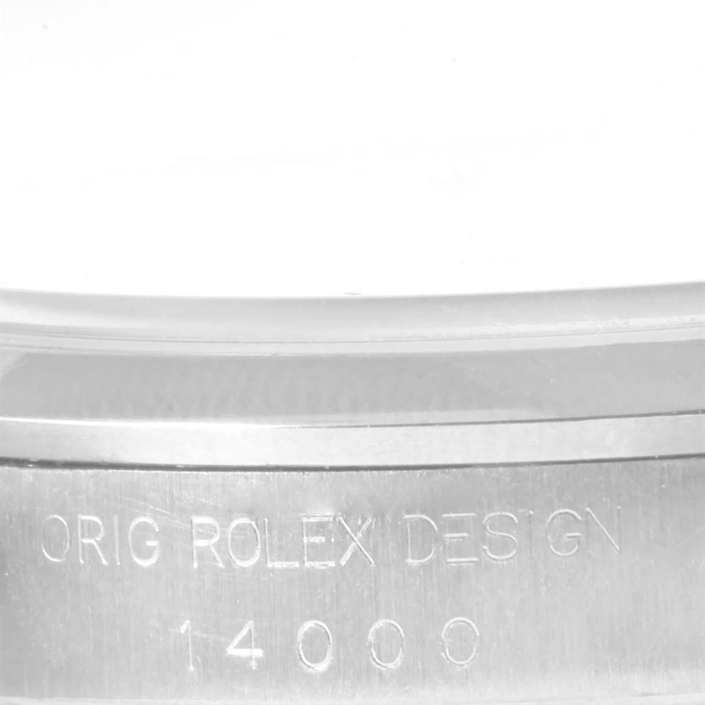 The image shows a close-up of the case side of a Rolex Air-King 19794 Men's Stainless Steel Blue Dial 19794 Men's Stainless Steel Blue Dial watch, highlighting the engraving "ORIG ROLEX DESIGN 14000."