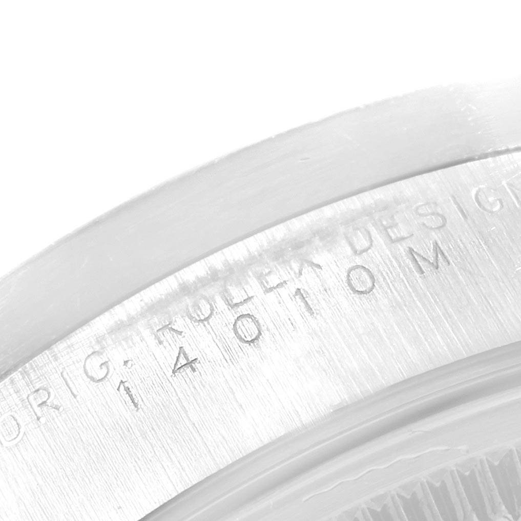 This image shows a close-up of the engraving on the case side of a Rolex Air-King 14010 Men's Stainless Steel Silver Dial 14010 Men's Stainless Steel Silver Dial watch.