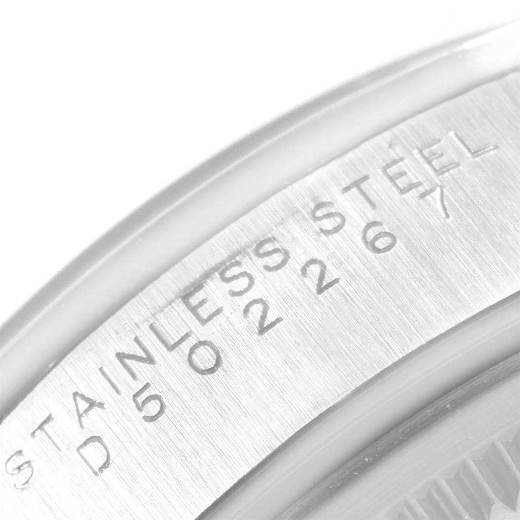 This image shows the engraved stainless steel serial number detail of the Rolex Air-King 14000 Men's Stainless Steel Black Dial 14000 Men's Stainless Steel Black Dial watch.