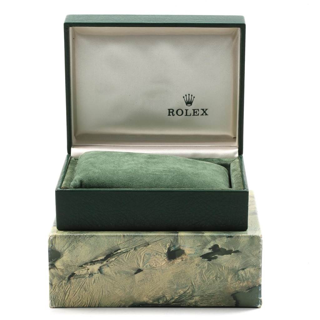 The image shows an open Rolex Air-King 14000 Men's Stainless Steel Black Dial 14000 Men's Stainless Steel Black Dial box with the cushion inside, displaying the brand's logo.